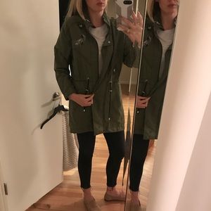 Green army jacket with embellishments